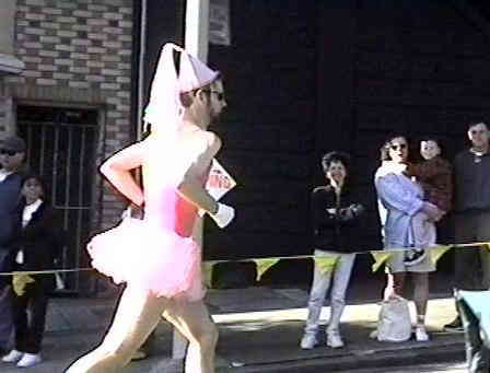 Bay to Breakers Race, man running in pink toto.