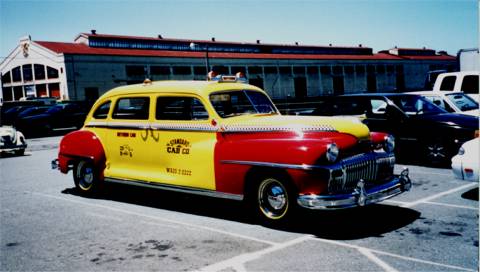 Old cab in parking lot